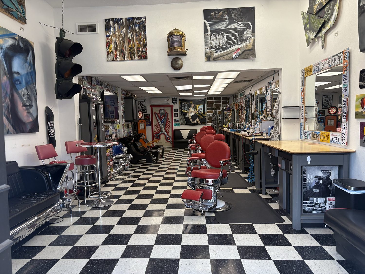 Caleb's Chopshop barber chairs and checkered floor